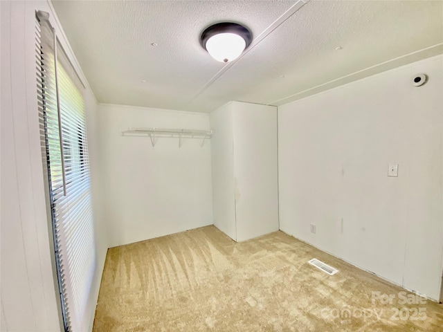 325 Scaley Bark Dr, Salisbury, NC 28147 - unfurnished room with carpet flooring and a textured ceiling