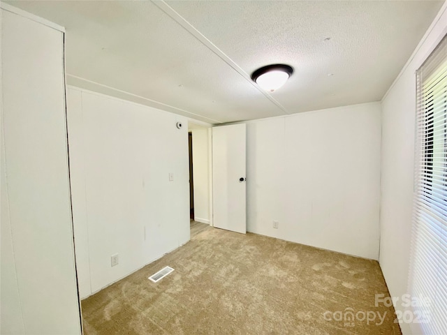 325 Scaley Bark Dr, Salisbury, NC 28147 - carpeted spare room featuring a textured ceiling