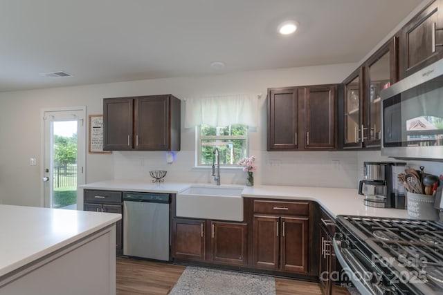 1736 Rhynes Trl, Rock Hill, SC 29732 - kitchen with appliances with stainless steel finishes, healthy amount of natural light, and dark brown cabinetry