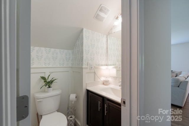 1736 Rhynes Trl, Rock Hill, SC 29732 - bathroom with vanity, wainscoting, wallpapered walls, and a decorative wall