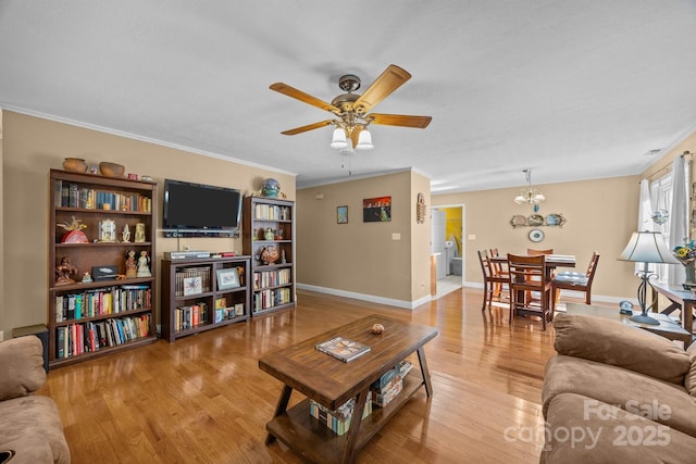 73 Waters Rd, Asheville, NC 28805 - living area with ceiling fan, light wood-type flooring, crown molding, and a chandelier