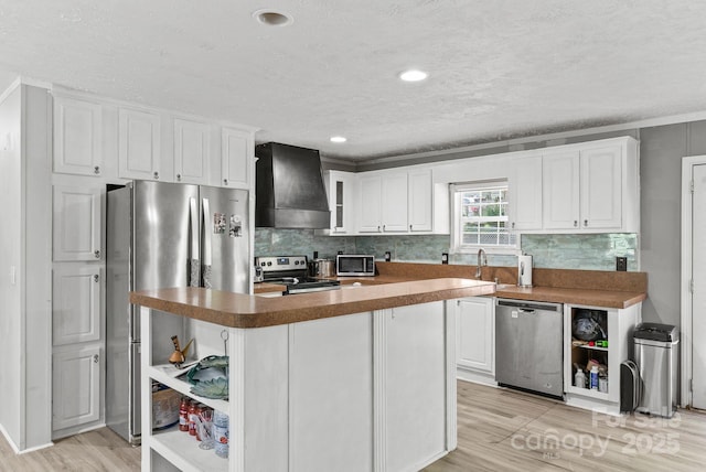 27 Sage Way, Clyde, NC 28721 - kitchen featuring stainless steel appliances, custom exhaust hood, open shelves, white cabinetry, and a textured ceiling