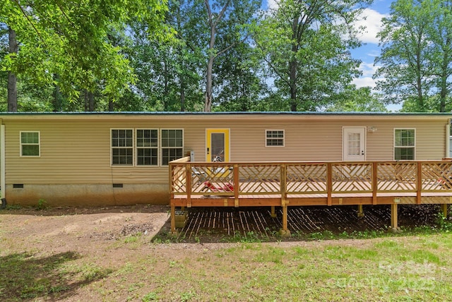 27 Sage Way, Clyde, NC 28721 - rear view of property with crawl space and a wooden deck