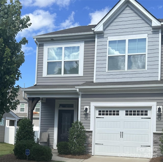 15005 Savannah Hall Dr Unit 72, Charlotte, NC 28273 - view of front of home featuring a garage and stone siding