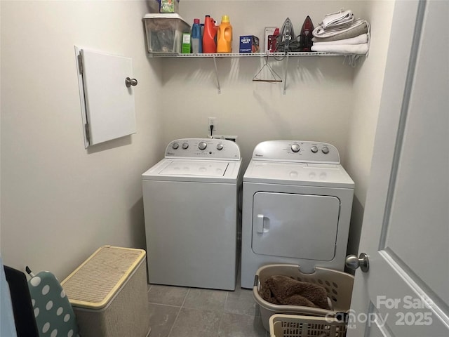 15005 Savannah Hall Dr Unit 72, Charlotte, NC 28273 - washroom with washer and clothes dryer and tile patterned floors