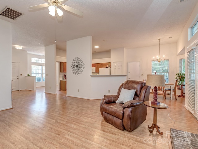 4801 Pennant Pl, Charlotte, NC 28212 - living area featuring a chandelier, light wood-style floors, ceiling fan, and recessed lighting