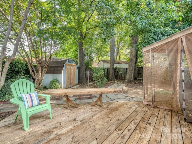 4801 Pennant Pl, Charlotte, NC 28212 - wooden terrace with a fenced backyard and a storage unit