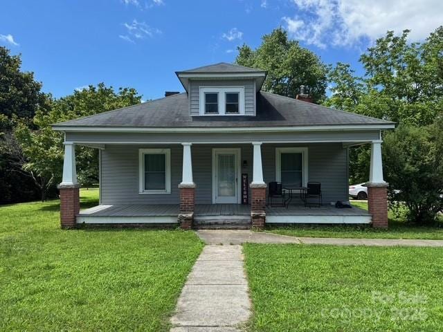 2417 Statesville Blvd, Salisbury, NC 28147 - view of front of home featuring covered porch and a front lawn
