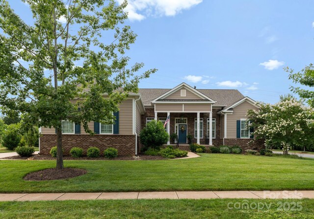 6506 Jepson Ct Unit 349, Charlotte, NC 28214 - craftsman house featuring brick siding and a front yard