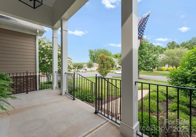 6506 Jepson Ct Unit 349, Charlotte, NC 28214 - covered porch with a yard