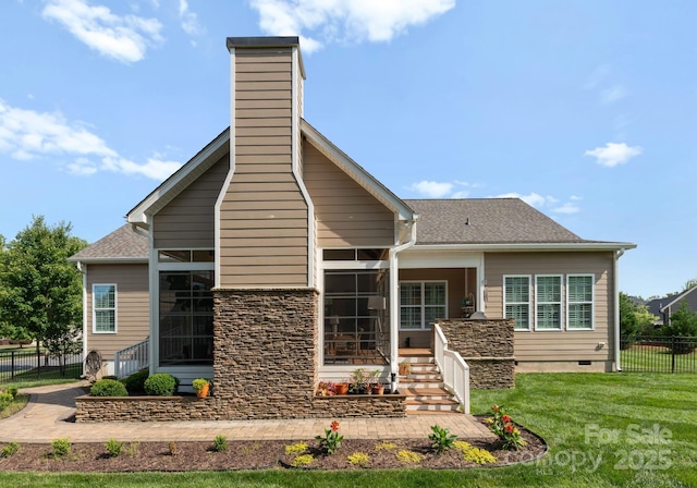 6506 Jepson Ct Unit 349, Charlotte, NC 28214 - rear view of property featuring a sunroom, a chimney, and roof with shingles