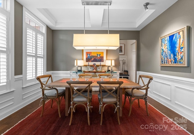 6506 Jepson Ct Unit 349, Charlotte, NC 28214 - dining room featuring dark wood-style flooring, a wainscoted wall, and a decorative wall