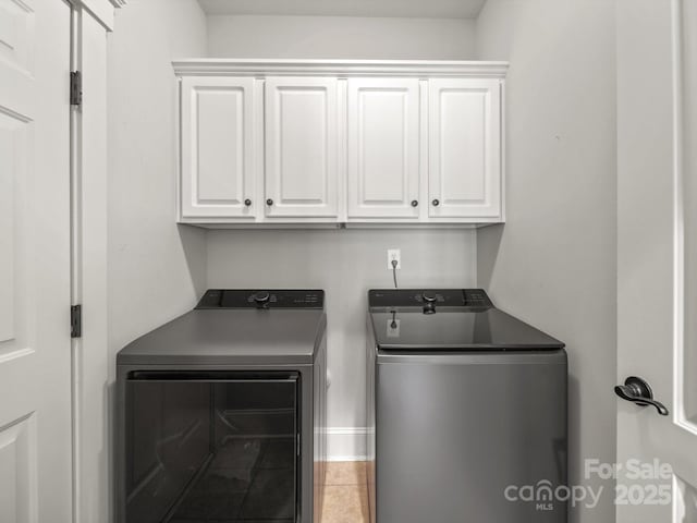 1169 Stuarts Landing Dr, Cramerton, NC 28032 - laundry room with separate washer and dryer, cabinet space, and tile patterned floors