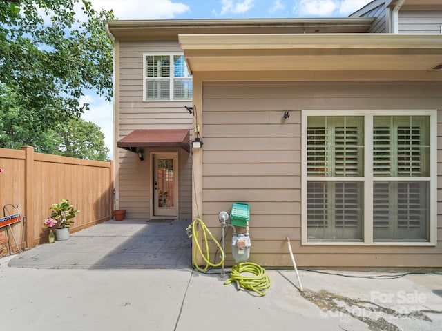 1169 Stuarts Landing Dr, Cramerton, NC 28032 - view of exterior entry with a patio area