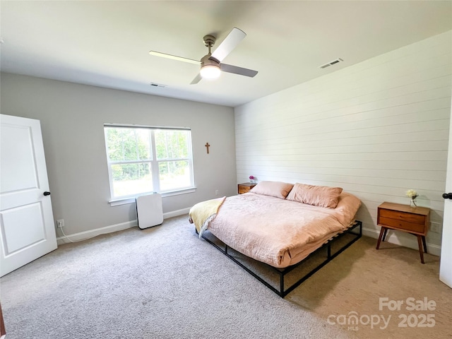 205 Spring Creek Dr, Mount Holly, NC 28120 - bedroom with light colored carpet and a ceiling fan