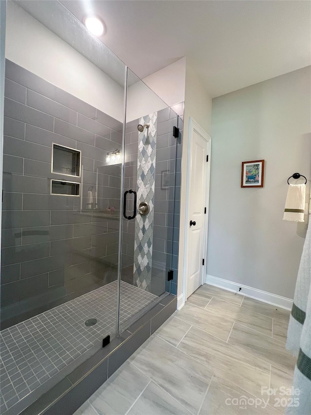 205 Spring Creek Dr, Mount Holly, NC 28120 - full bathroom with a stall shower and baseboards