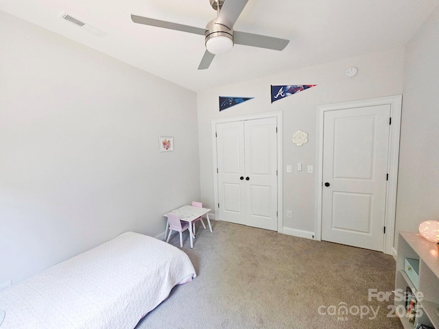 205 Spring Creek Dr, Mount Holly, NC 28120 - bedroom with carpet floors, a closet, and a ceiling fan