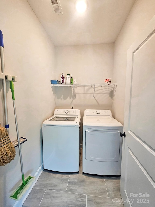 205 Spring Creek Dr, Mount Holly, NC 28120 - laundry room with separate washer and dryer
