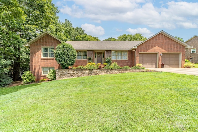 7029 Forest Hills Dr, Denver, NC 28037 - view of front of house featuring brick siding, an attached garage, a front yard, and concrete driveway