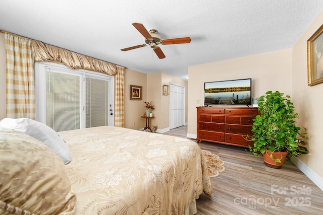 7029 Forest Hills Dr, Denver, NC 28037 - bedroom with wood finished floors and a ceiling fan
