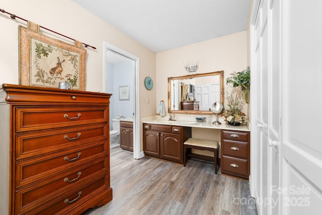 7029 Forest Hills Dr, Denver, NC 28037 - bathroom featuring vanity and wood finished floors