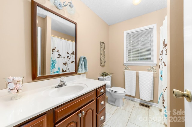 7029 Forest Hills Dr, Denver, NC 28037 - bathroom featuring vanity, a textured ceiling, tile patterned flooring, and curtained shower