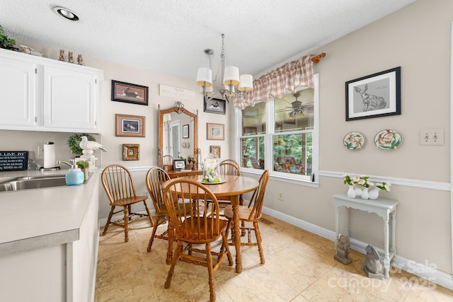 7029 Forest Hills Dr, Denver, NC 28037 - dining space featuring a chandelier and a textured ceiling