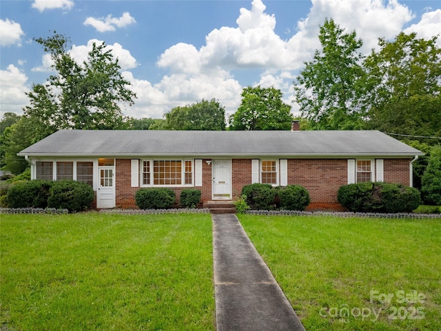 1132 Arbor Dr, Salisbury, NC 28144 - single story home featuring brick siding, a front lawn, and a chimney