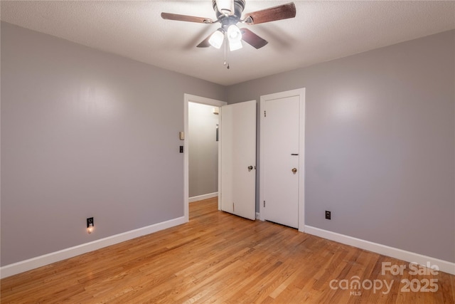 1132 Arbor Dr, Salisbury, NC 28144 - unfurnished bedroom with light wood finished floors and a ceiling fan