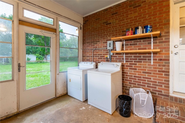 1132 Arbor Dr, Salisbury, NC 28144 - washroom with separate washer and dryer, crown molding, healthy amount of natural light, and brick wall