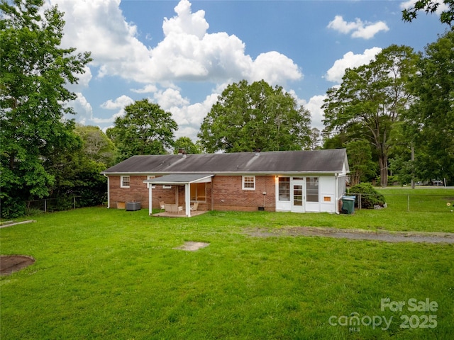 1132 Arbor Dr, Salisbury, NC 28144 - rear view of house featuring brick siding, crawl space, and view of scattered trees