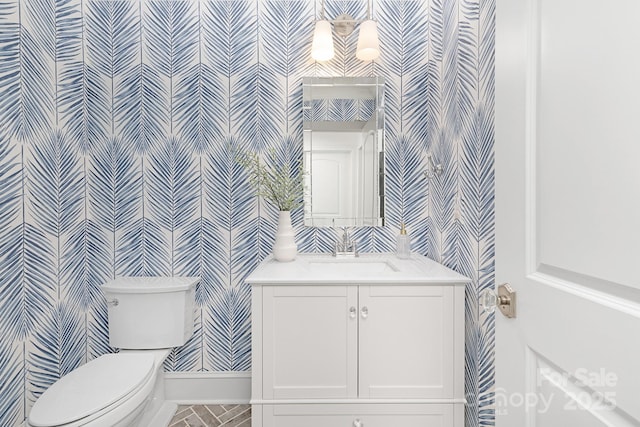 5611 Robinhood Rd, Charlotte, NC 28211 - bathroom featuring wallpapered walls and vanity