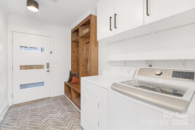 5611 Robinhood Rd, Charlotte, NC 28211 - washroom with cabinet space, separate washer and dryer, brick flooring, and crown molding