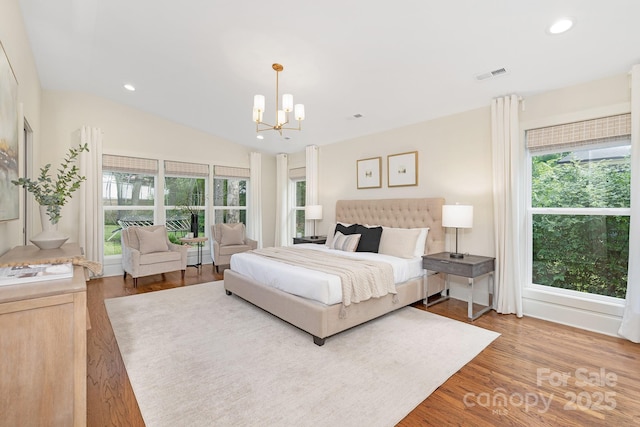 5611 Robinhood Rd, Charlotte, NC 28211 - bedroom featuring multiple windows, wood finished floors, a chandelier, recessed lighting, and lofted ceiling