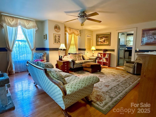 192 W Court St, Rutherfordton, NC 28139 - living area featuring wood finished floors and a ceiling fan