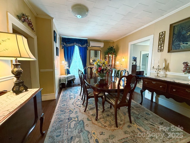 192 W Court St, Rutherfordton, NC 28139 - dining room with a wall unit AC, dark wood-type flooring, and ornamental molding