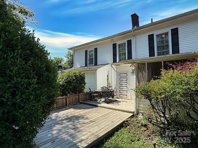 192 W Court St, Rutherfordton, NC 28139 - rear view of property featuring a deck and a chimney