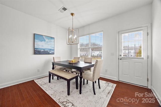 8312 Compton Acres Ln, Waxhaw, NC 28173 - dining room featuring a chandelier and dark wood-style floors
