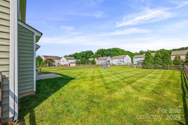 8312 Compton Acres Ln, Waxhaw, NC 28173 - fenced backyard featuring a playground