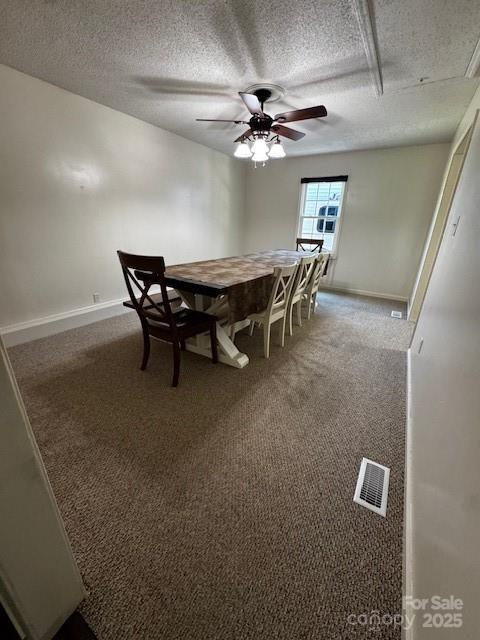 3375 Shepherd Rd, Maiden, NC 28650 - dining area with ceiling fan, a textured ceiling, and carpet flooring