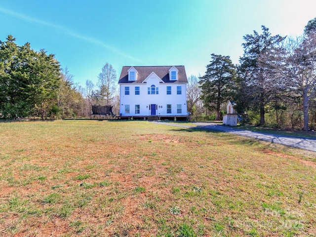 4652 Rocky Hollow Rd 4658, 4654, Davidson, NC 28036 - colonial house featuring a front lawn, a storage shed, and a wooden deck
