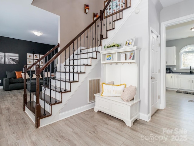 4652 Rocky Hollow Rd 4658, 4654, Davidson, NC 28036 - stairs with wood finished floors and baseboards