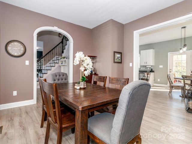 4652 Rocky Hollow Rd 4658, 4654, Davidson, NC 28036 - dining area featuring light wood-type flooring and stairway