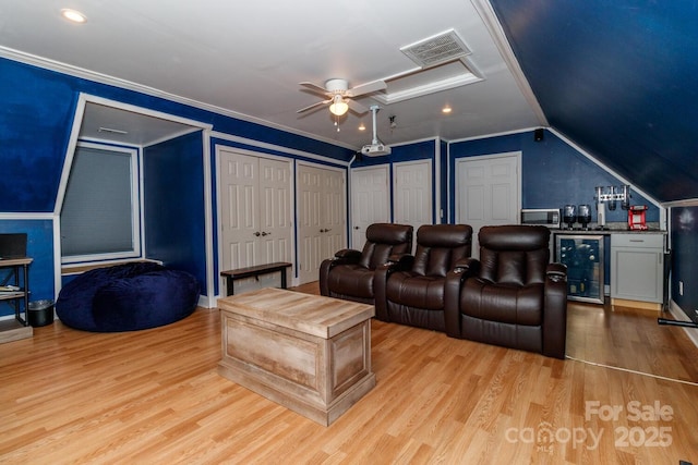 4652 Rocky Hollow Rd 4658, 4654, Davidson, NC 28036 - cinema room featuring wine cooler, ceiling fan, wood finished floors, a dry bar, and ornamental molding