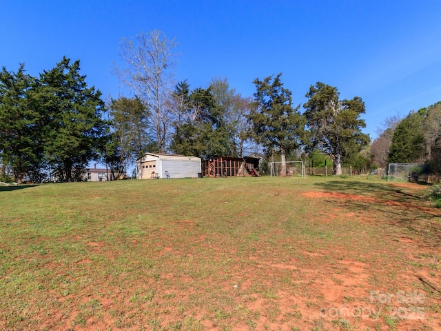 4652 Rocky Hollow Rd 4658, 4654, Davidson, NC 28036 - view of green lawn with an outdoor structure