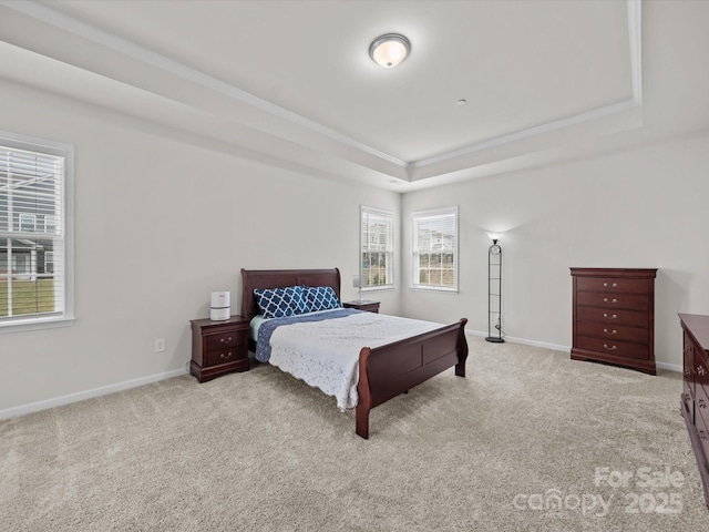 9582 Creighton Rd NW, Concord, NC 28027 - carpeted bedroom featuring multiple windows, a raised ceiling, and crown molding