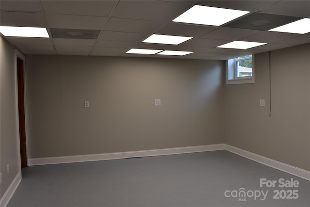 1038 Holmes Ave, Salisbury, NC 28144 - basement featuring a paneled ceiling and baseboards
