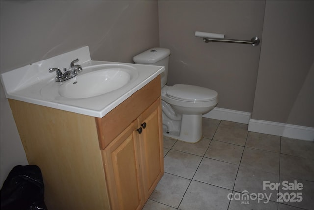1038 Holmes Ave, Salisbury, NC 28144 - bathroom featuring tile patterned floors and vanity