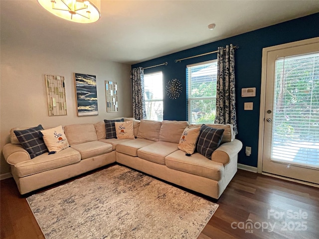 9608 Brackenview Ct, Charlotte, NC 28214 - living room with dark wood-type flooring and baseboards
