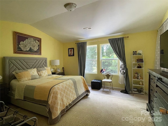 9608 Brackenview Ct, Charlotte, NC 28214 - bedroom with light colored carpet and vaulted ceiling